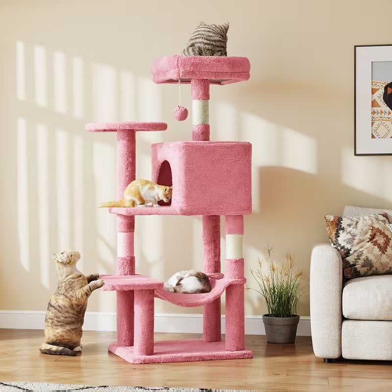 Pink cat tree shown in a living room