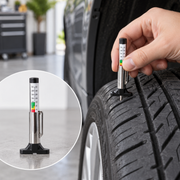 Tire Tread Depth Gauge checking tire tread in a garage
