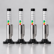 Four matching tire tread depth gauges arranged as a 4 pack